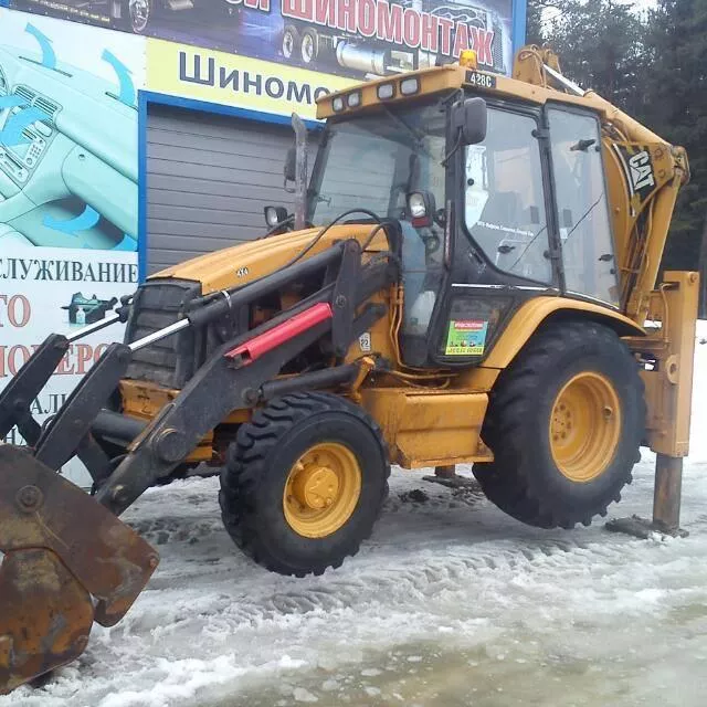 Аренда экскаватора-погрузчика CAT 428Е