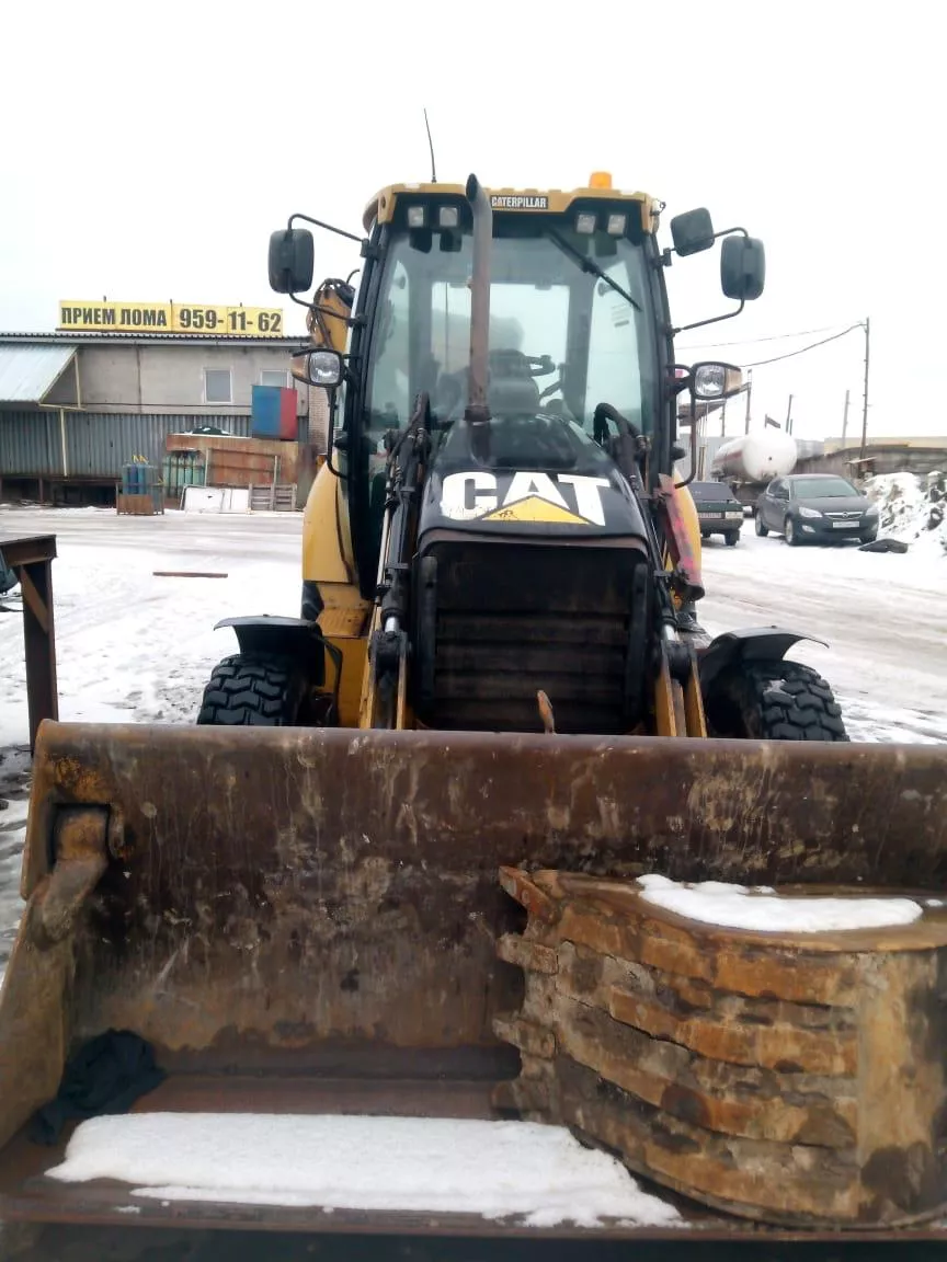 Аренда экскаватора-погрузчика CAT 428Е