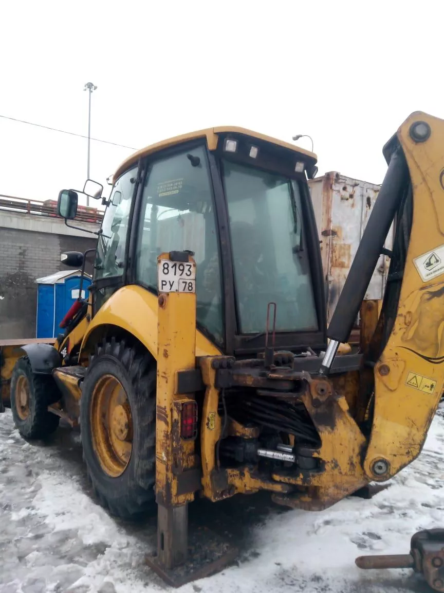 Аренда экскаватора-погрузчика CAT 428Е