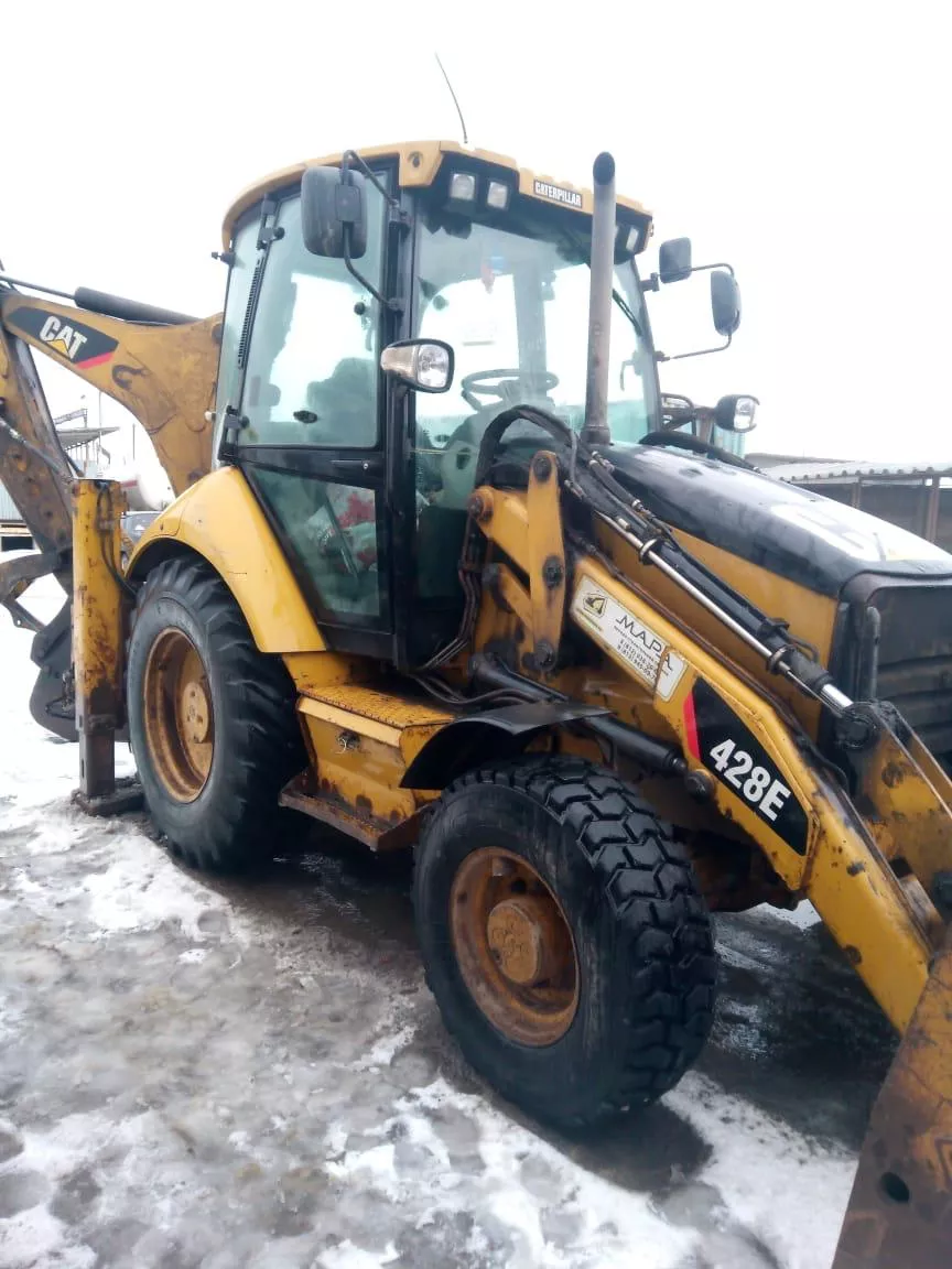 Аренда экскаватора-погрузчика CAT 428Е